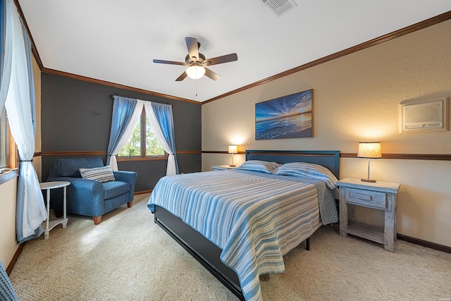 carpeted bedroom with baseboards, a ceiling fan, visible vents, and crown molding