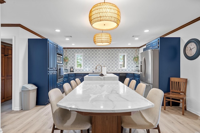 dining room featuring ornamental molding, recessed lighting, and light wood finished floors