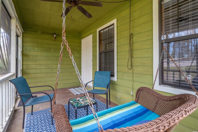 exterior space featuring ceiling fan