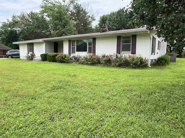 811 N 1st St, Glenwood, AR 71943 - ranch-style house with a front yard and a chimney