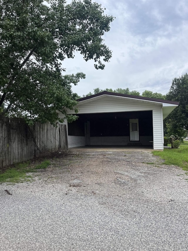 811 N 1st St, Glenwood, AR 71943 - garage with gravel driveway