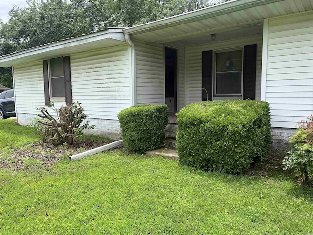 811 N 1st St, Glenwood, AR 71943 - view of home's exterior featuring a yard and a porch