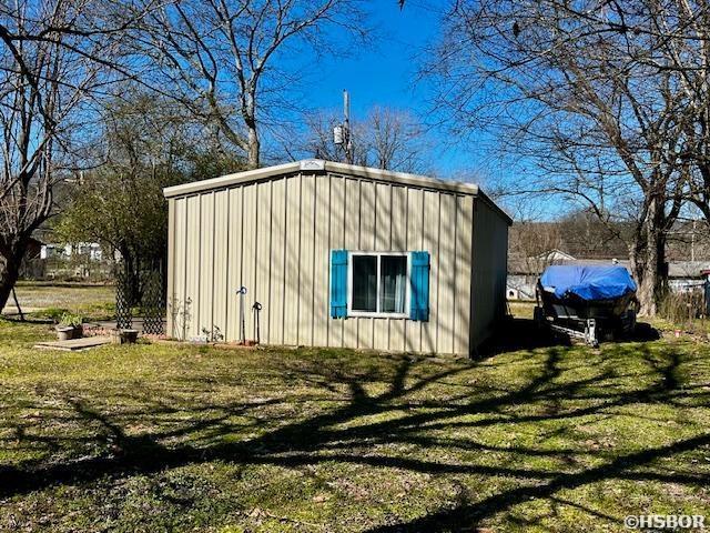 view of outbuilding with an outbuilding