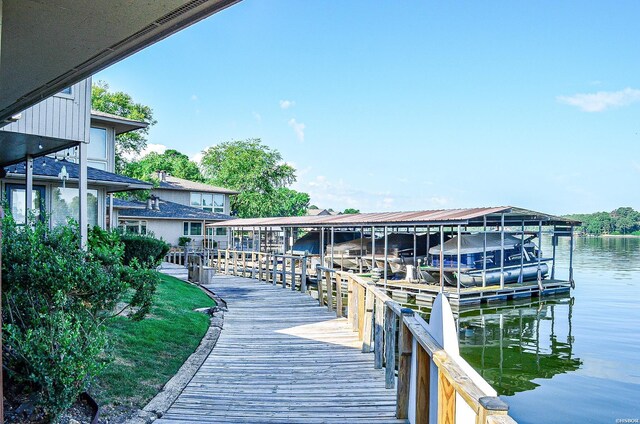 dock area featuring a water view and boat lift