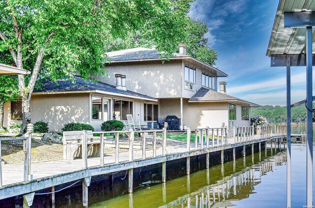 view of dock with a water view