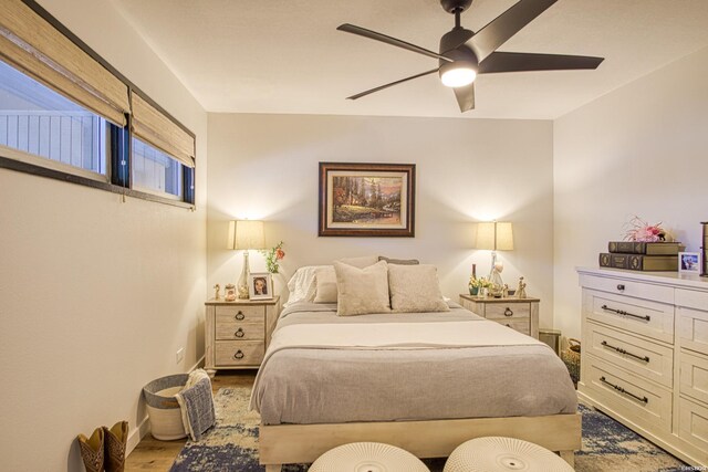 bedroom featuring ceiling fan and light wood-type flooring