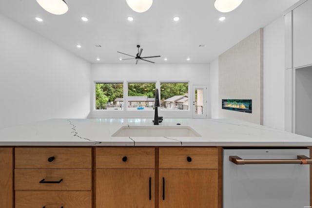 168 Krause Ln Unit B, Hot Springs, AR 71913 - kitchen with a sink, dishwasher, light stone counters, recessed lighting, and a large fireplace