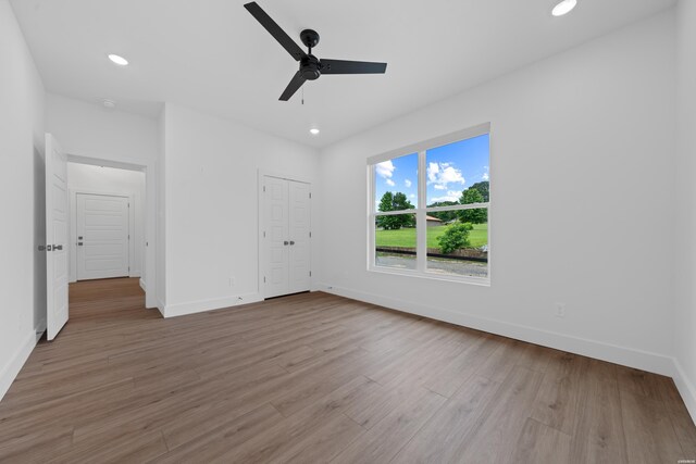 168 Krause Ln Unit B, Hot Springs, AR 71913 - unfurnished bedroom with baseboards, wood finished floors, recessed lighting, and a ceiling fan