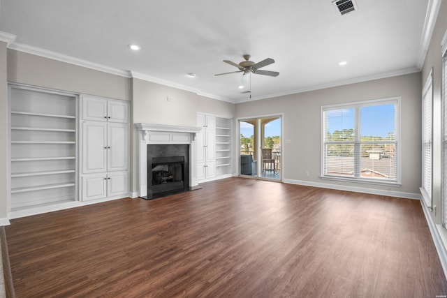 unfurnished living room with baseboards, visible vents, dark wood-type flooring, and a high end fireplace