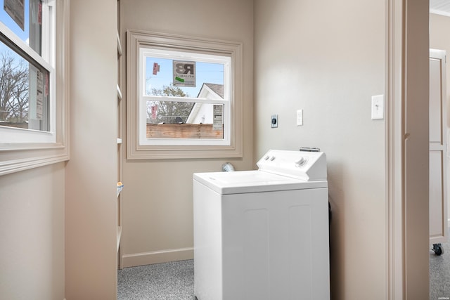 washroom with washer / dryer, baseboards, and laundry area