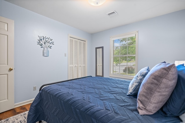 206 Shawnee St, Hot Springs, AR 71901 - bedroom with wood finished floors, baseboards, and a closet