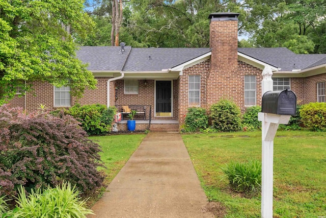 206 Shawnee St, Hot Springs, AR 71901 - single story home featuring roof with shingles, a chimney, a front yard, and brick siding