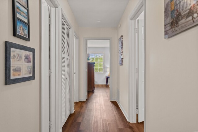 206 Shawnee St, Hot Springs, AR 71901 - hallway featuring dark wood-style floors and baseboards
