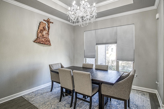 308 Blue Bell Ct, Hot Springs, AR 71901 - dining room featuring ornamental molding, a raised ceiling, a notable chandelier, and dark wood-style flooring