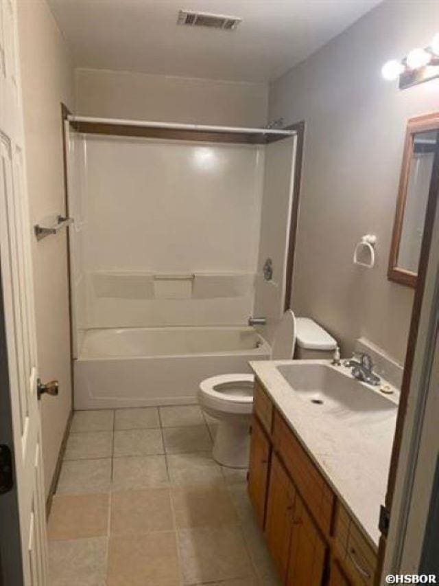 1526 Pearcy Rd, Pearcy, AR 71964 - bathroom with toilet, vanity, tile patterned flooring, and tub / shower combination