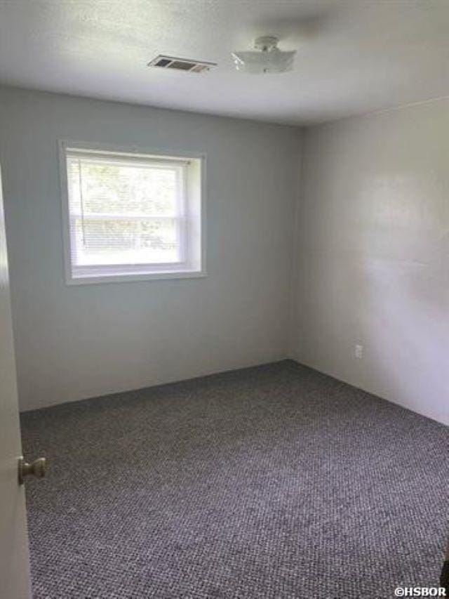 1526 Pearcy Rd, Pearcy, AR 71964 - view of carpeted spare room