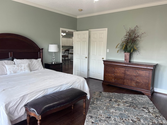 bedroom with dark wood-type flooring, ornamental molding, and baseboards