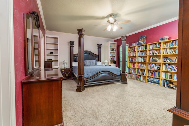 carpeted bedroom featuring ornamental molding and ceiling fan