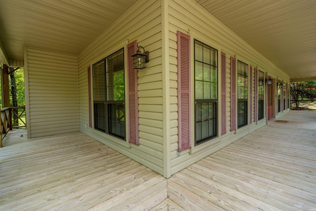 wooden deck featuring covered porch