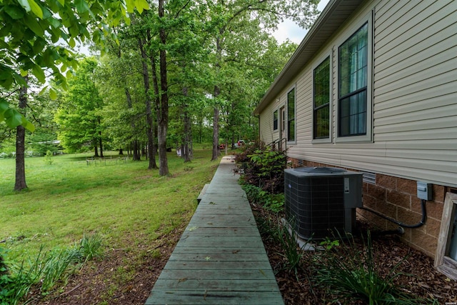 view of yard with central AC unit