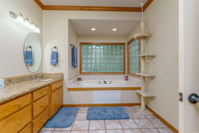 full bathroom featuring vanity, tile patterned flooring, baseboards, and a bath