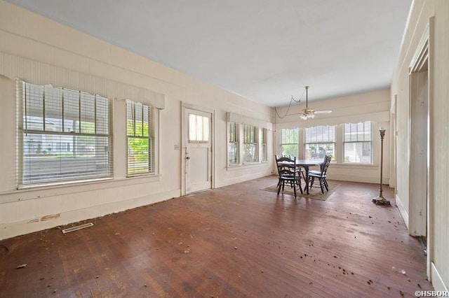 dining room featuring ceiling fan and hardwood / wood-style floors
