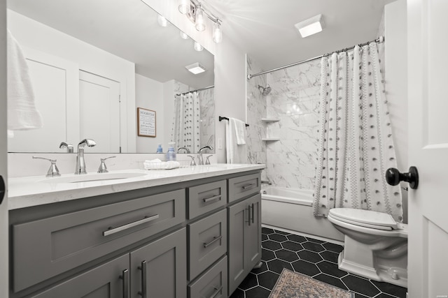 624 Ridgeway St, Hot Springs, AR 71901 - full bathroom with double vanity, shower / bath combo, and tile patterned floors