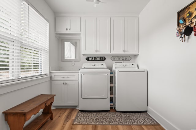 624 Ridgeway St, Hot Springs, AR 71901 - laundry room with separate washer and dryer, cabinet space, light wood finished floors, and ceiling fan
