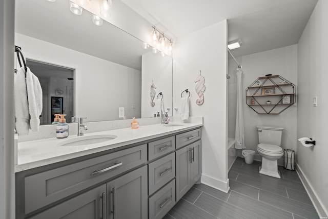 624 Ridgeway St, Hot Springs, AR 71901 - bathroom featuring double vanity, shower / bath combo with shower curtain, and tile patterned floors