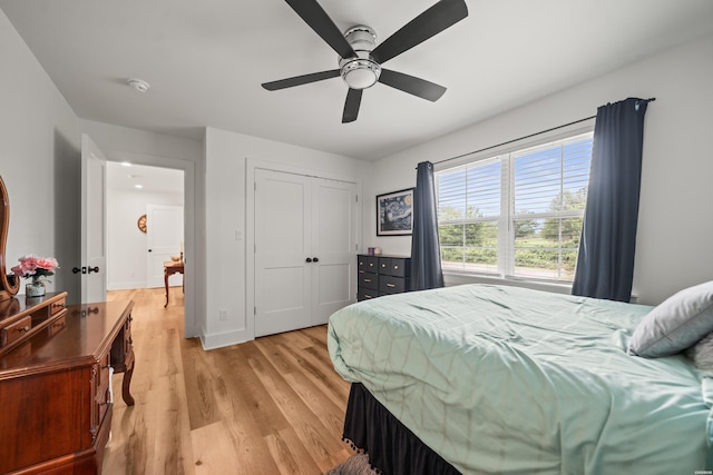 624 Ridgeway St, Hot Springs, AR 71901 - bedroom with light wood finished floors, a closet, and ceiling fan