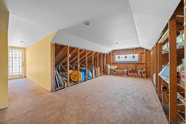 interior space featuring vaulted ceiling