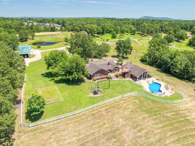 drone / aerial view with a view of trees