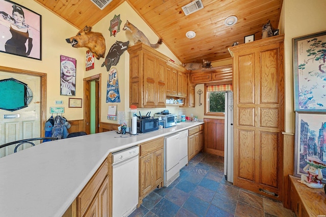 kitchen featuring dishwasher, light countertops, wooden ceiling, and visible vents