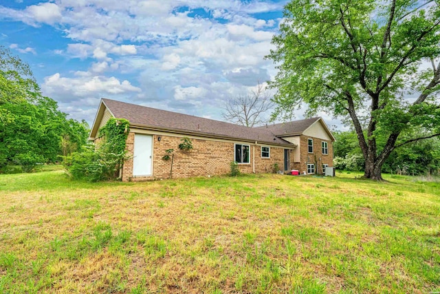 75 Grant 7, Sheridan, AR 72150 - tri-level home with a front lawn and brick siding