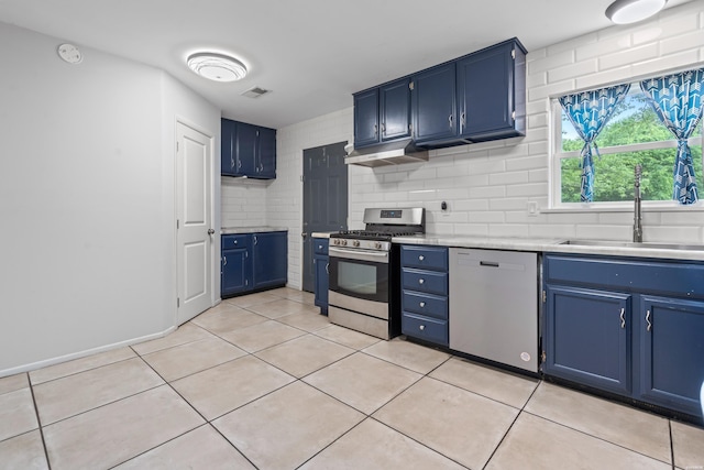 75 Grant 7, Sheridan, AR 72150 - kitchen featuring a sink, under cabinet range hood, stainless steel range with gas cooktop, dishwashing machine, and blue cabinets