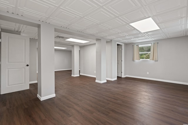 75 Grant 7, Sheridan, AR 72150 - basement featuring dark wood-type flooring, visible vents, and baseboards