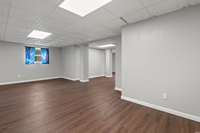 75 Grant 7, Sheridan, AR 72150 - below grade area featuring dark wood-style floors and baseboards
