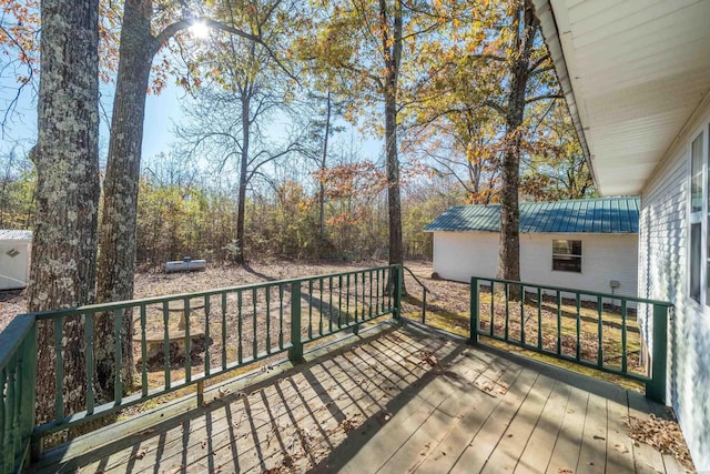 deck with an outdoor structure