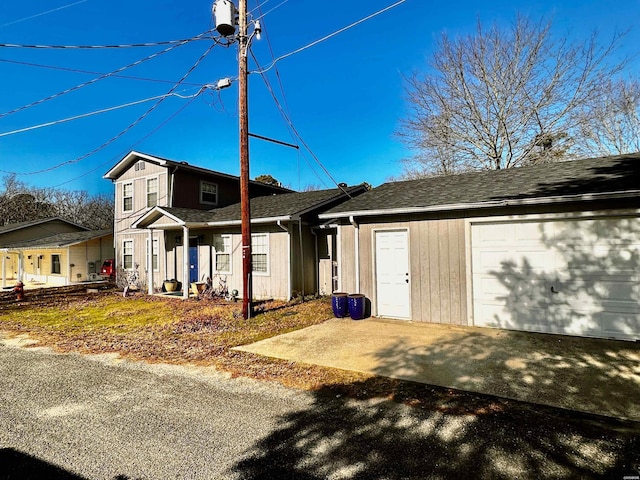 exterior space with a garage