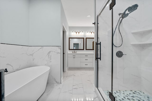 202 Quail Ridge Dr, Hot Springs, AR 71901 - bathroom featuring a soaking tub, a shower stall, vanity, and marble finish flooring