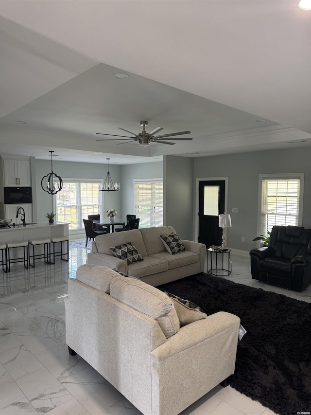 202 Quail Ridge Dr, Hot Springs, AR 71901 - living area with a chandelier, light marble finish flooring, a ceiling fan, recessed lighting, and a tray ceiling