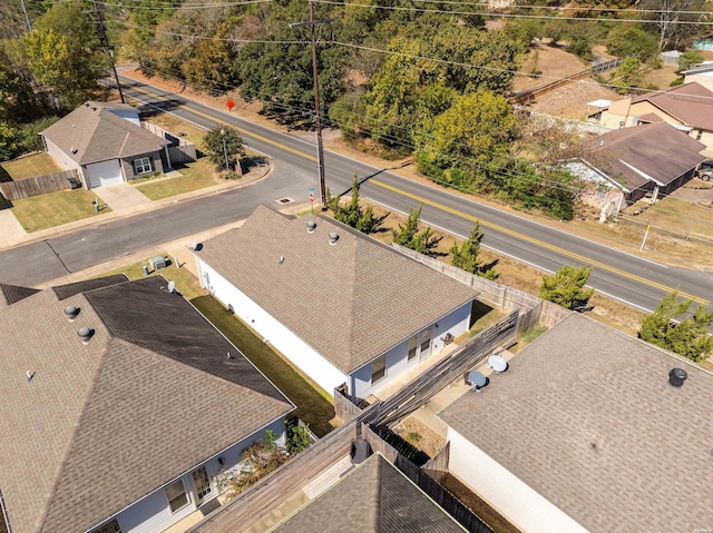 birds eye view of property with a residential view