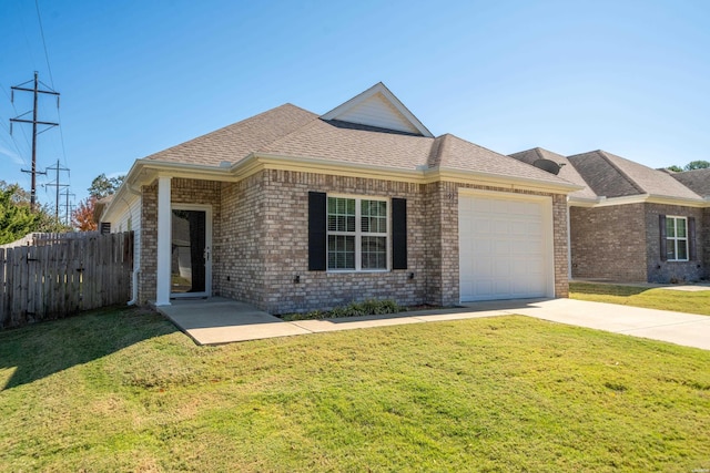 single story home featuring a garage, concrete driveway, fence, and a front lawn