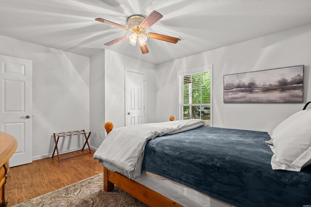 67 Delton Mccauley Rd, Kirby, AR 71950 - bedroom featuring wood finished floors and ceiling fan