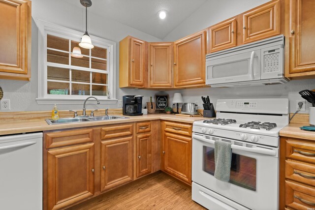 67 Delton Mccauley Rd, Kirby, AR 71950 - kitchen with white appliances, a sink, light countertops, light wood finished floors, and pendant lighting