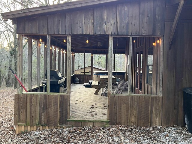 wooden deck featuring grilling area