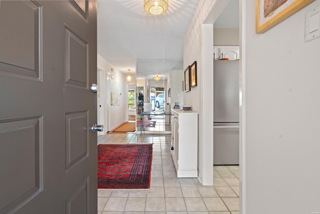 entryway featuring light tile patterned floors