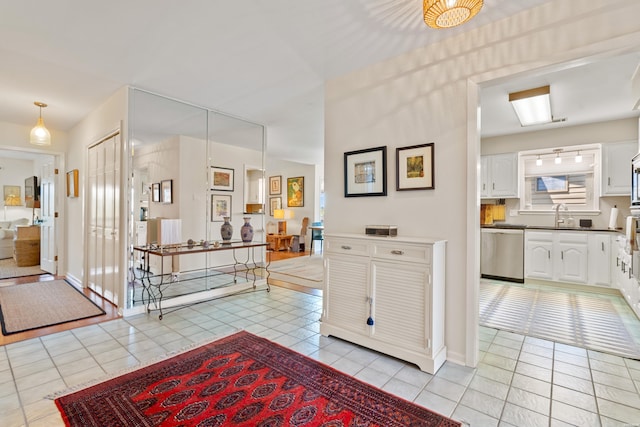 entryway featuring light tile patterned floors