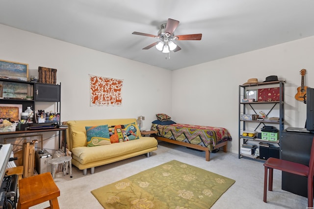 carpeted bedroom with a ceiling fan