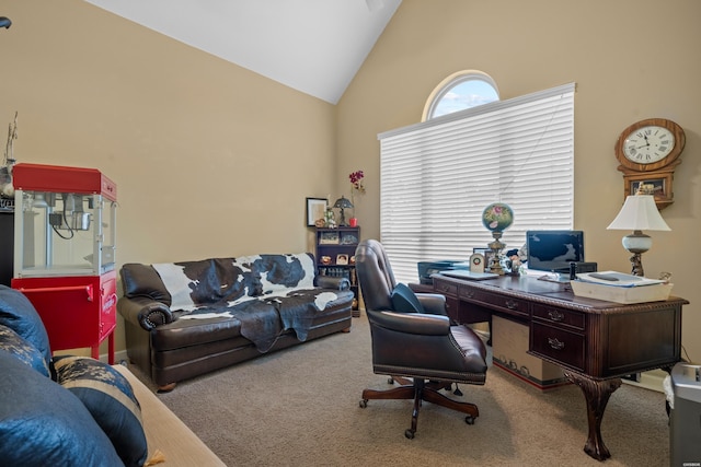 office with light carpet and high vaulted ceiling